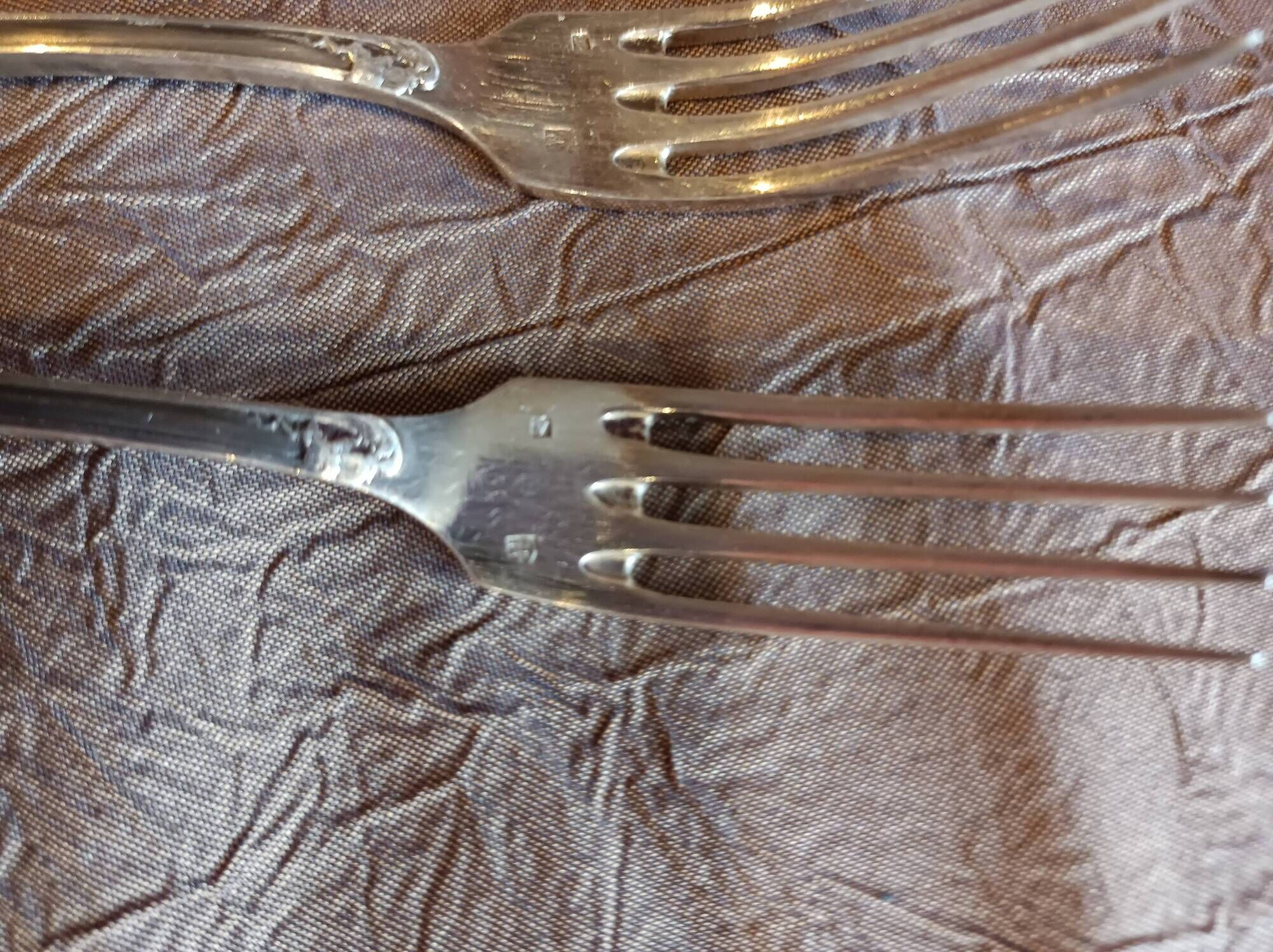 5 silver forks