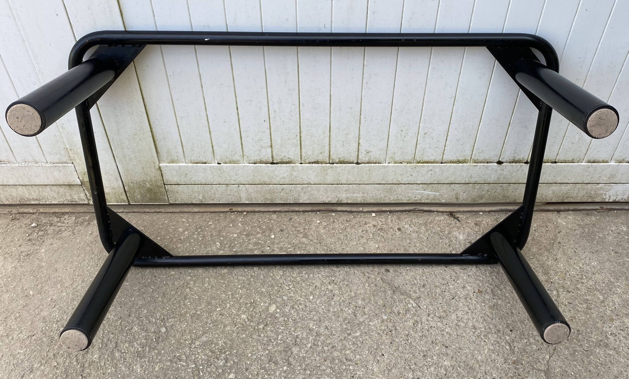 Vintage black tubular coffee table with smoked glass by Yves Boutboul, 1980.