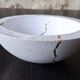 Kintsugi-inspired concrete and gold leaf cup