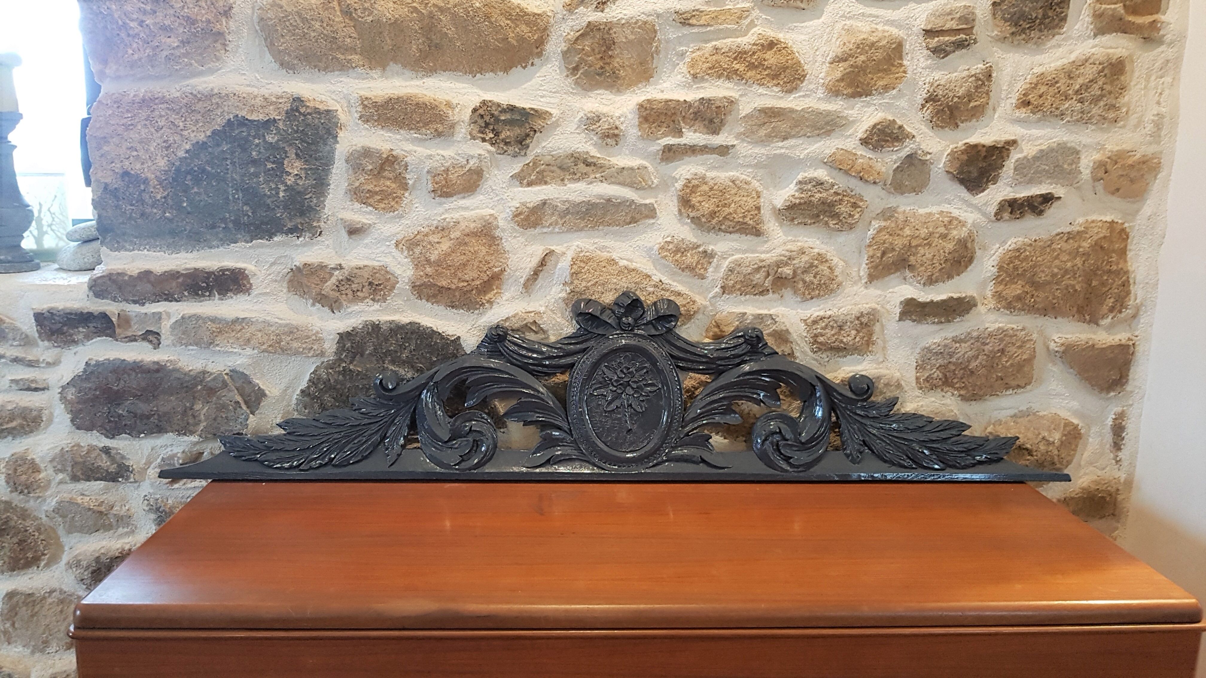 Old carved wooden pediment