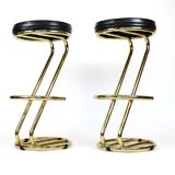 Pair of high brass stools