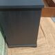 Vintage commode revamped in matte black & wood with warm tones.
