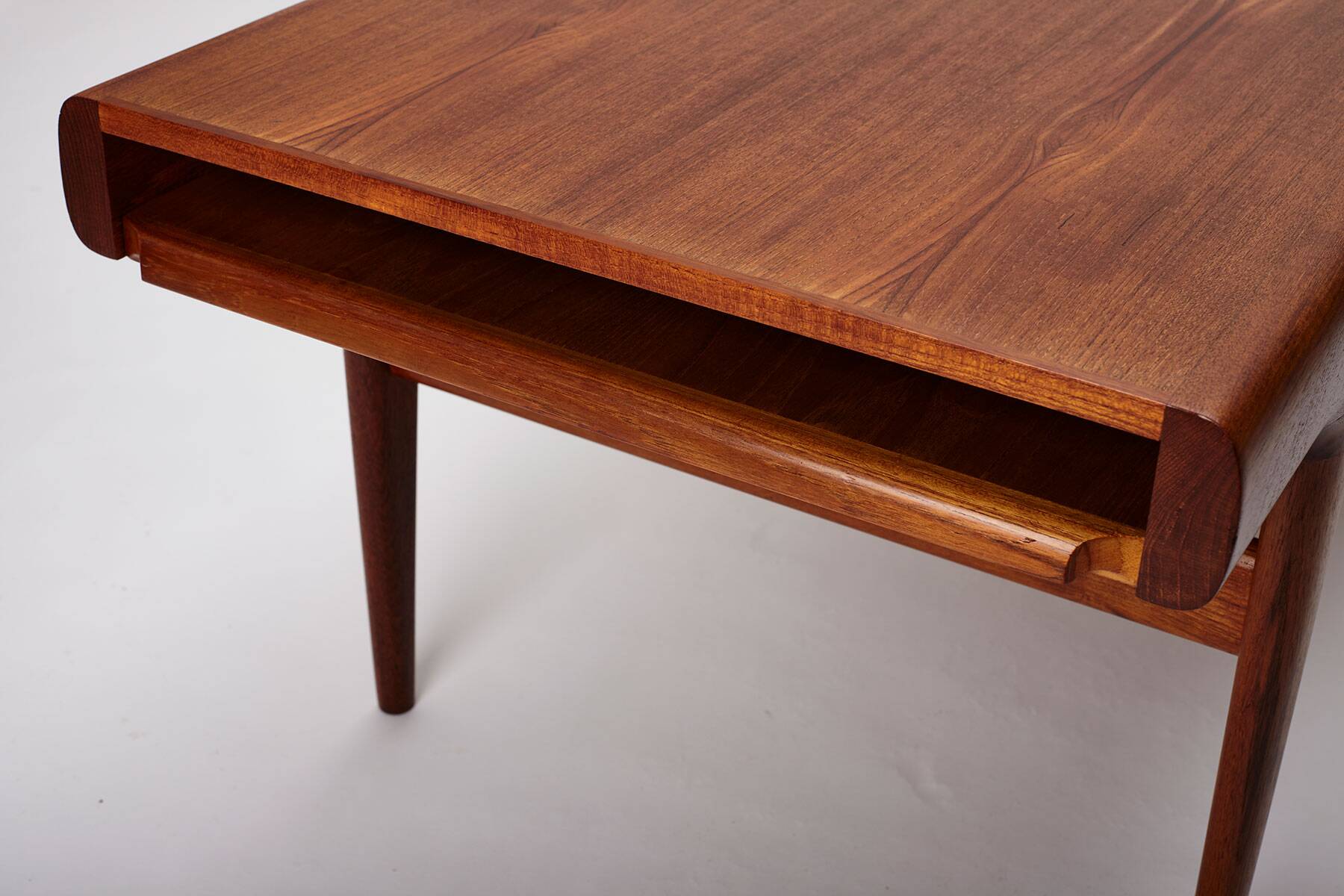 Extendable coffee table designed by Johannes Andersen for Uldum Møbelfabrik, Denmark, 1960s.