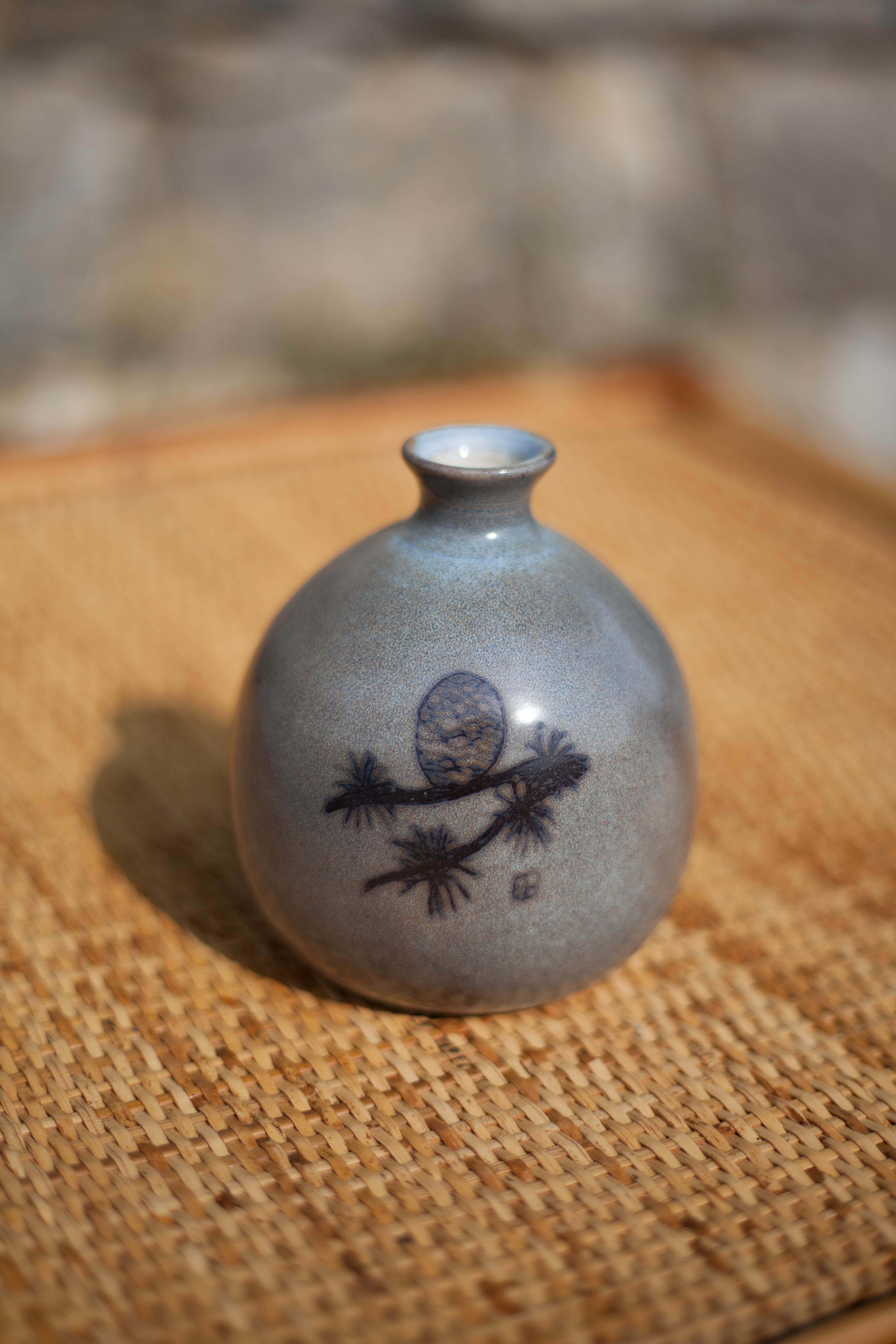 Glazed terracotta ball vase