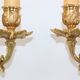 Pair of Louis XV style beveled mirror sconces in bronze by Lucien Gau