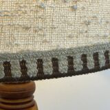 Brutalist floor lamp in turned wood, in the style of Charles Dudouyt.