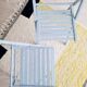 Blue folding chairs in lacquered wood