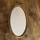 Oval gold knot mirror