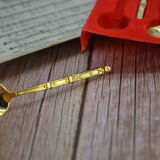 Set of 4 vintage golden spoons