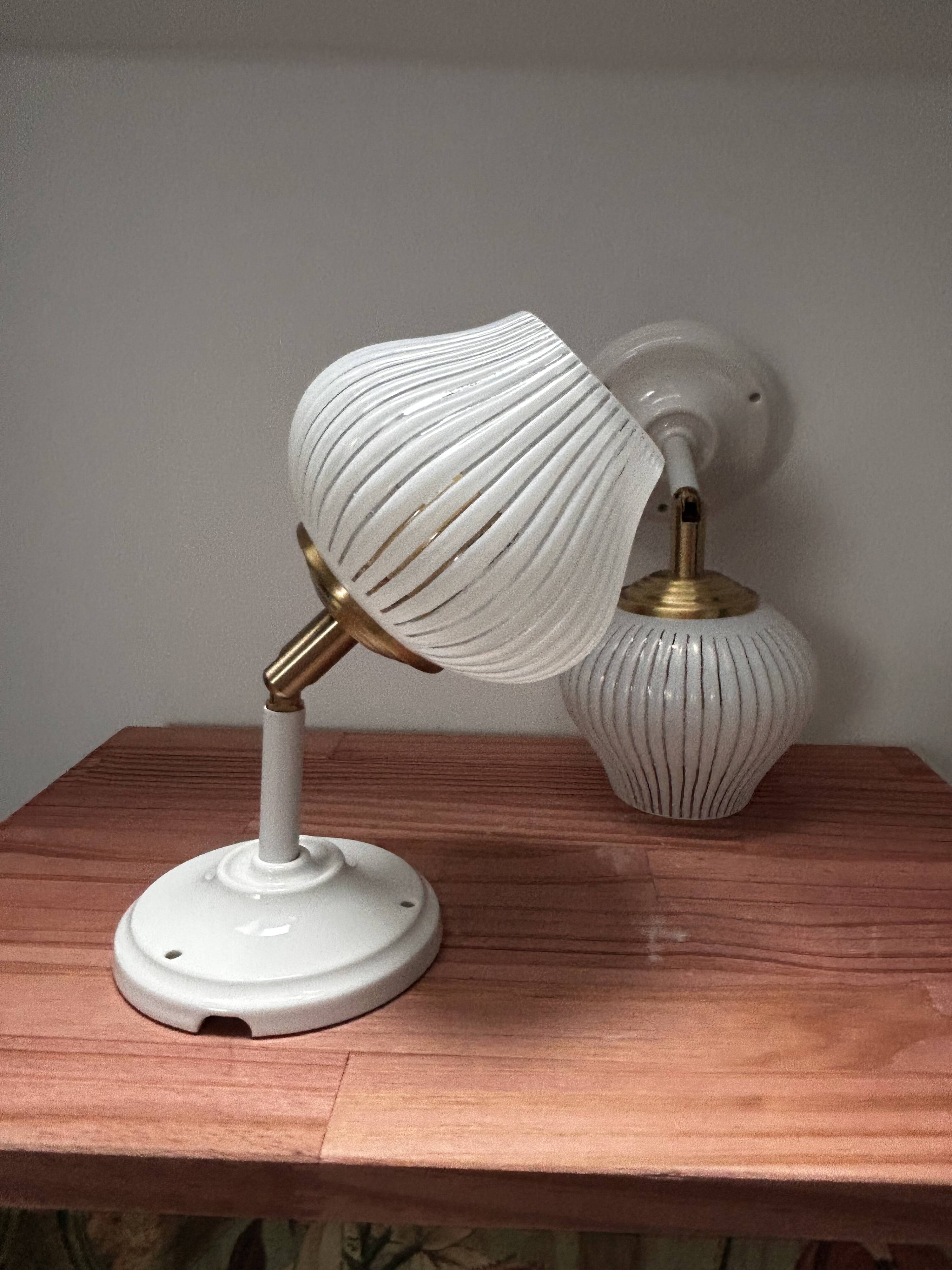 Pair of vintage white globe tilting wall sconces