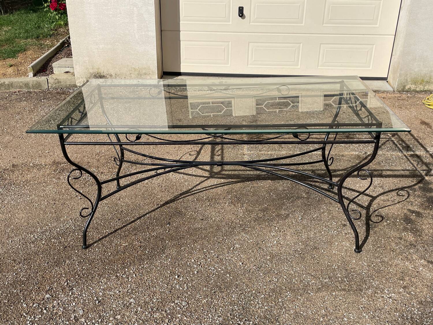 Glass and iron table with two side tables and 8 chairs
