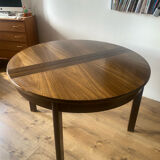 Table with an oak veneer and butterfly extension.