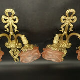 Pair of sconces with the heads of Zephyr Louis XVI style