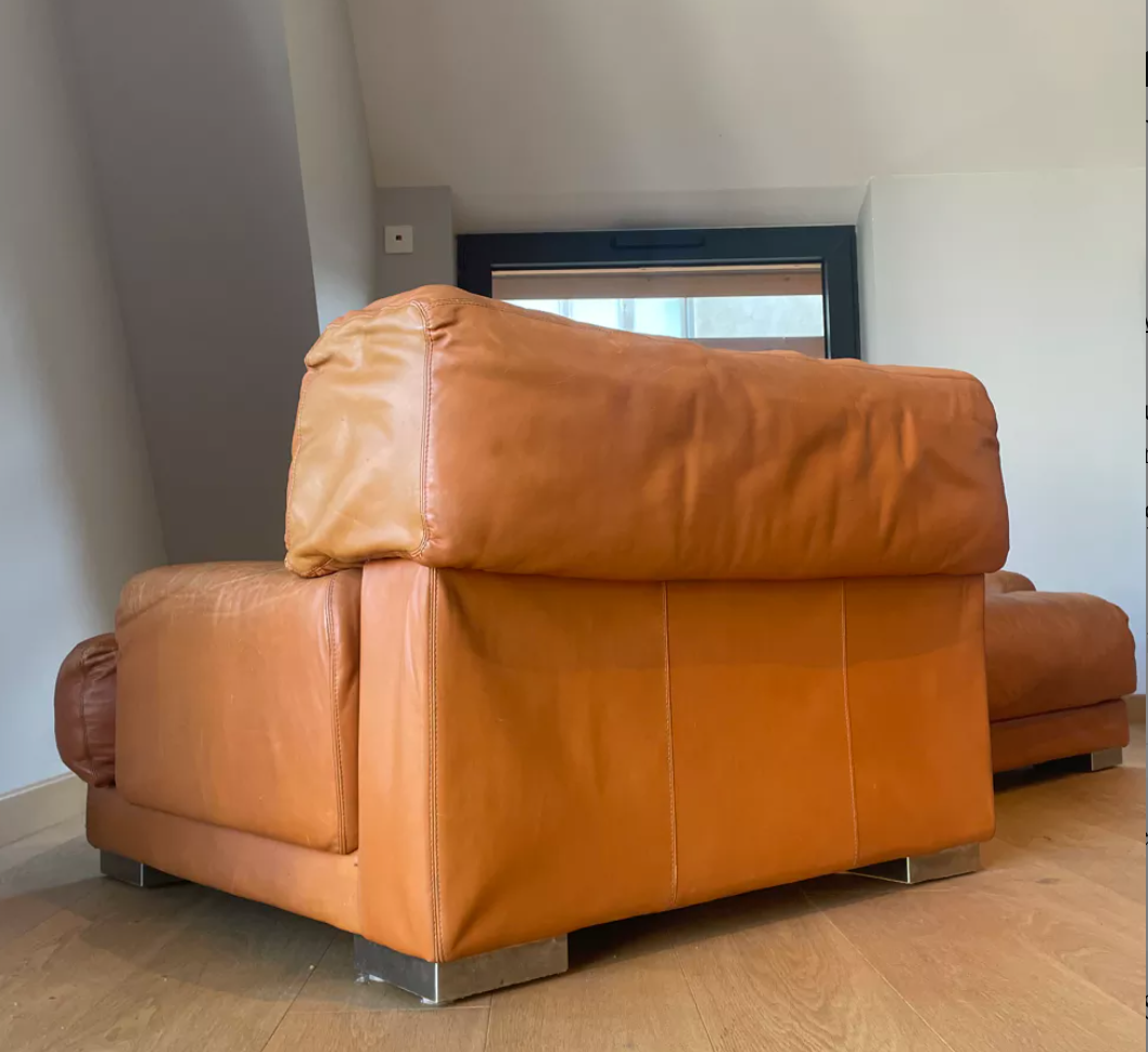Pair of vintage armchairs Gérard Guermonprez tawny leather and stainless steel, France 1970