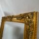 Miroir biseauté style empire doré 64x54cm