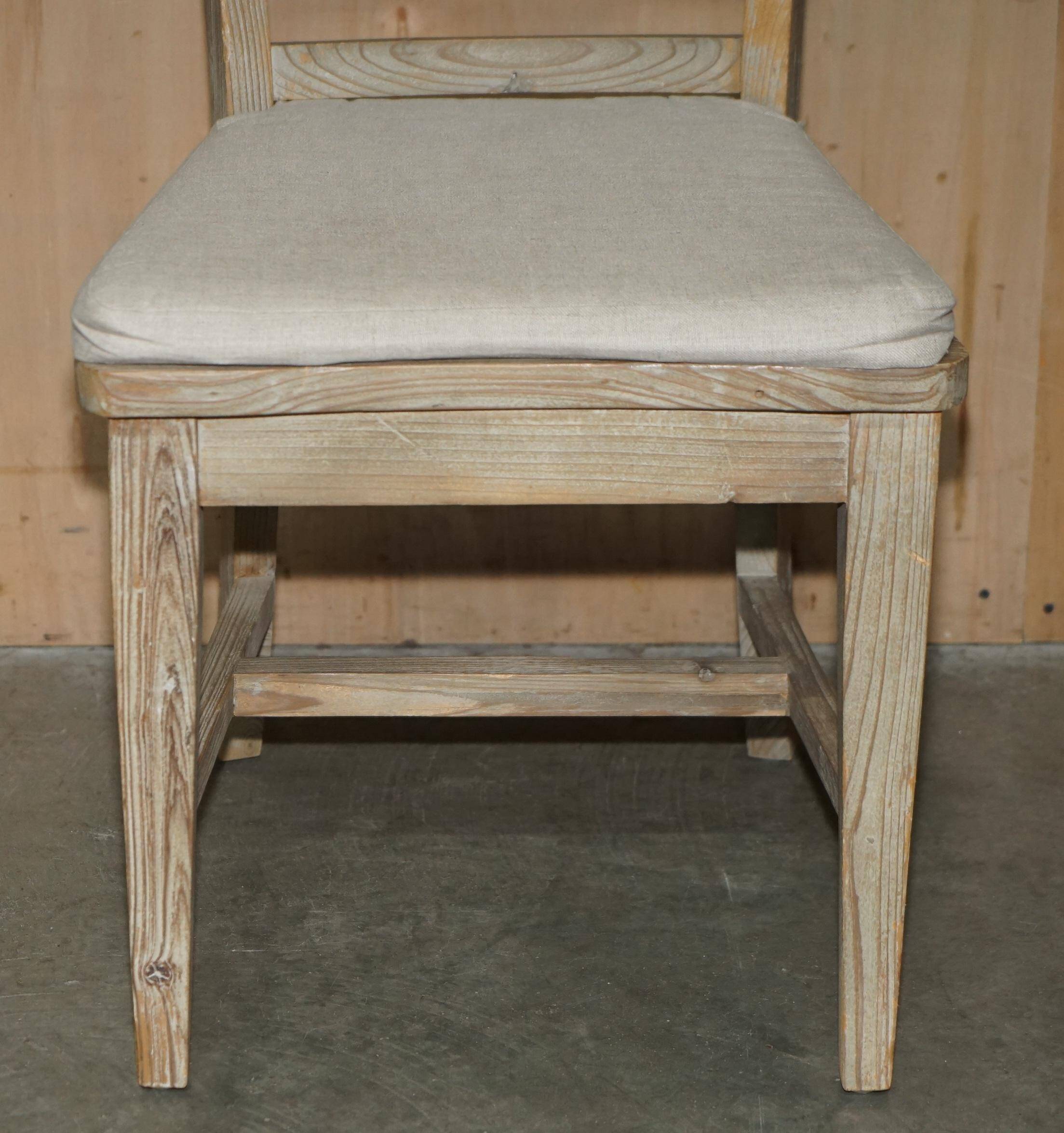 Pair of Swedish-style accent chairs in recycled pine with upholstered seats.