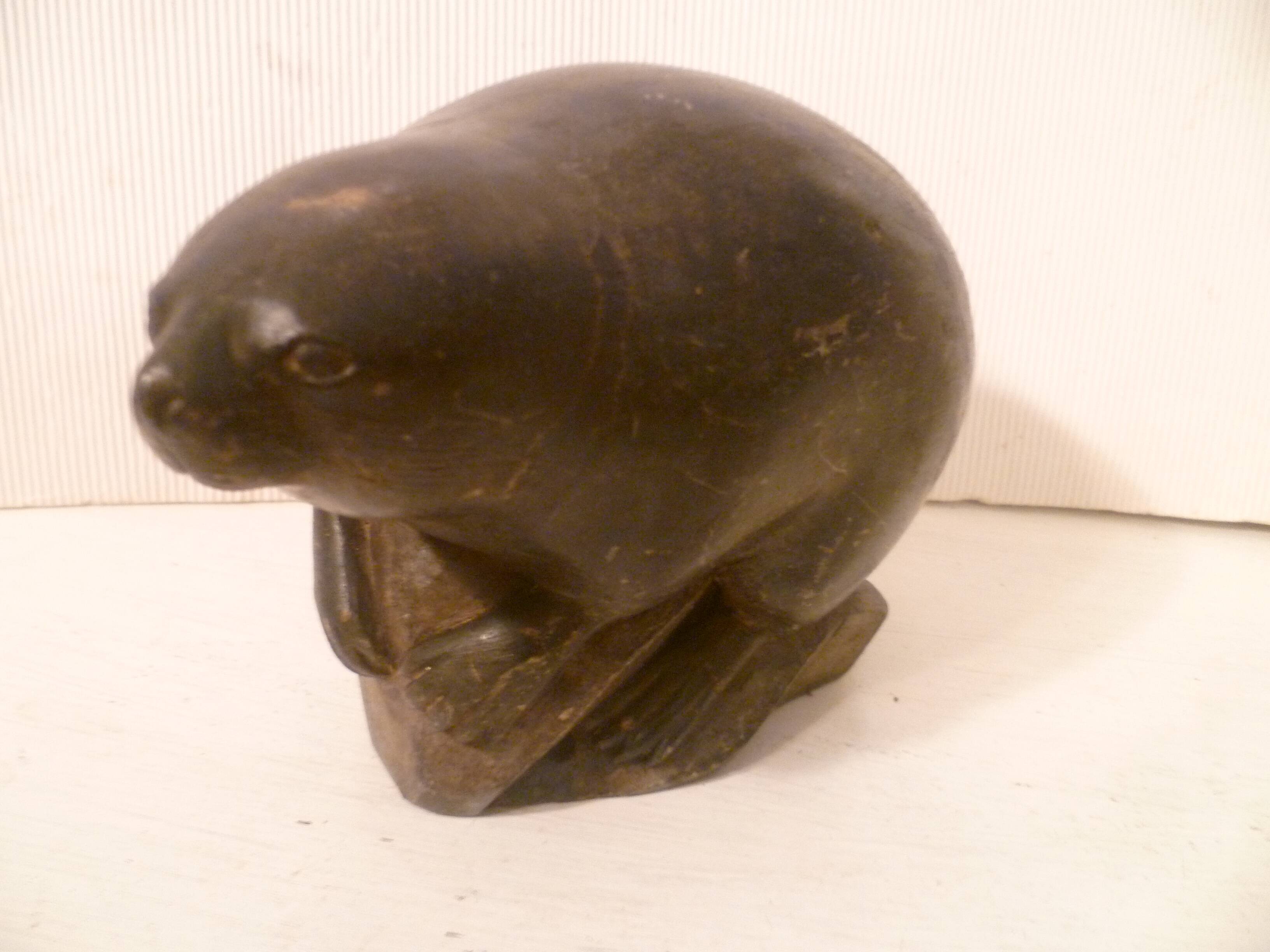Ancient inuit seal sculpture in stone