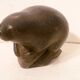 Ancient inuit seal sculpture in stone