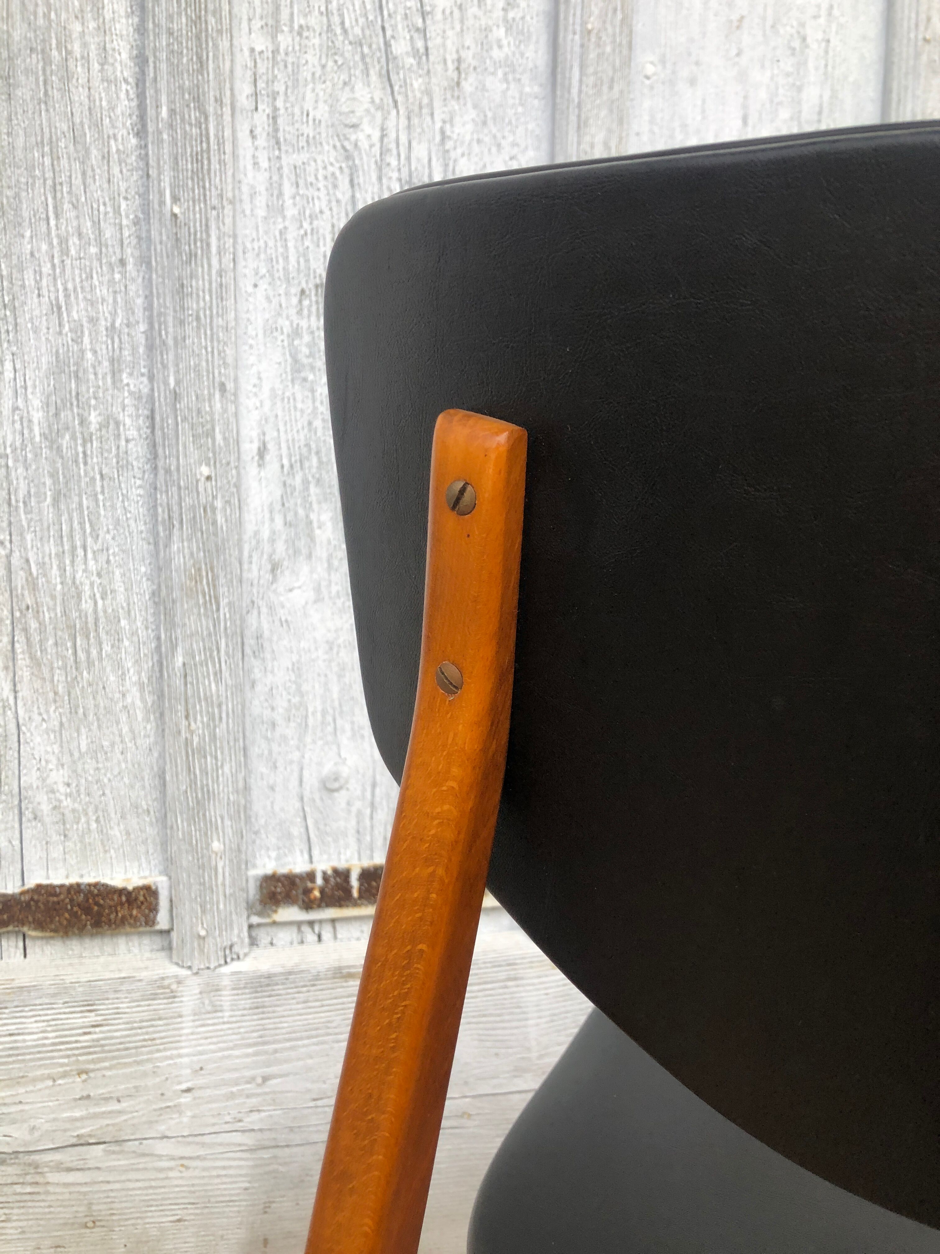 Set of 4 Scandinavian teak and black skai chairs