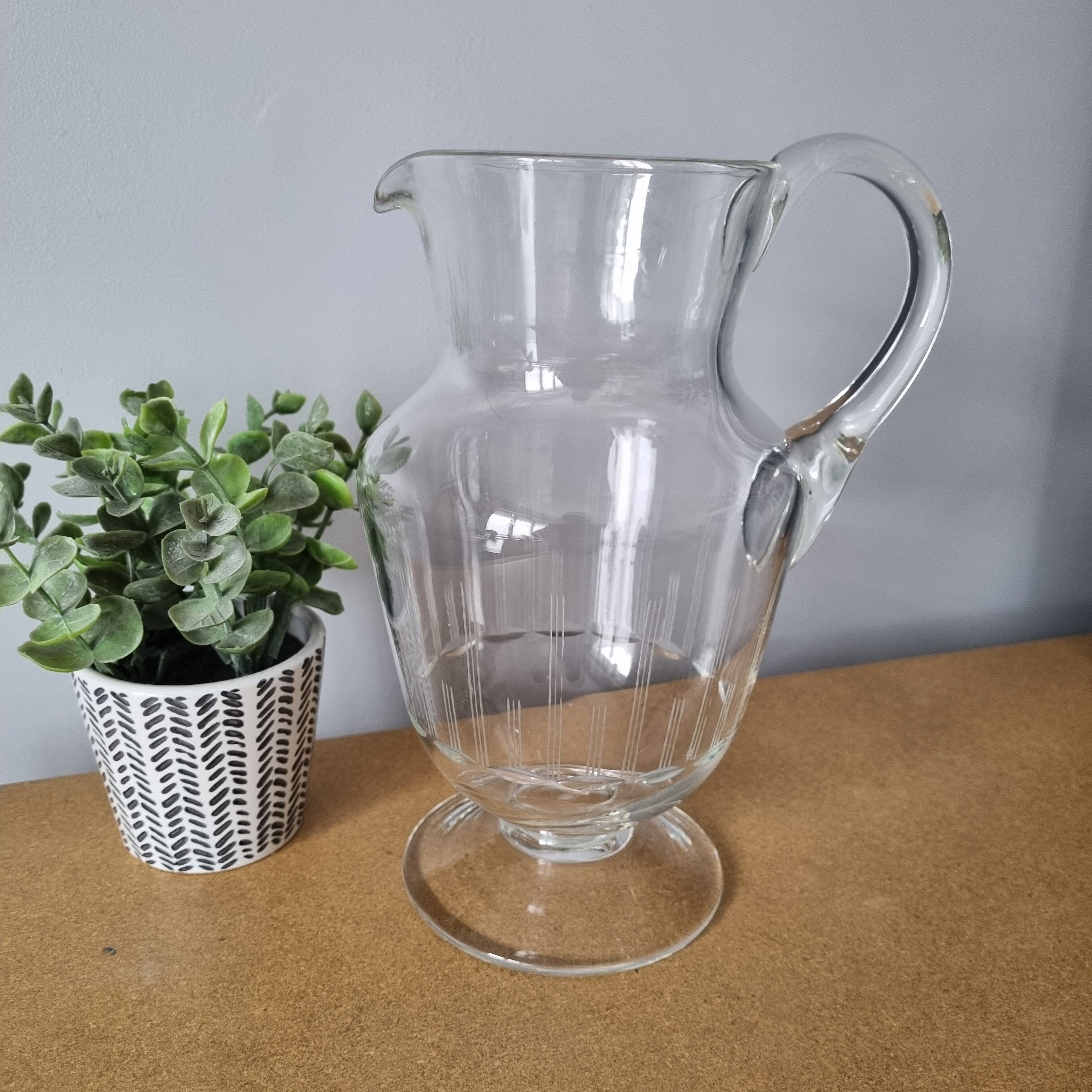Antique pitcher in blown glass