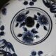 A pair of Chinese blue and white ovoid vases and flush-fitting circular covers