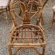 dining table and chairs made of curved bamboo and rattan with smoked glass from the 1970s