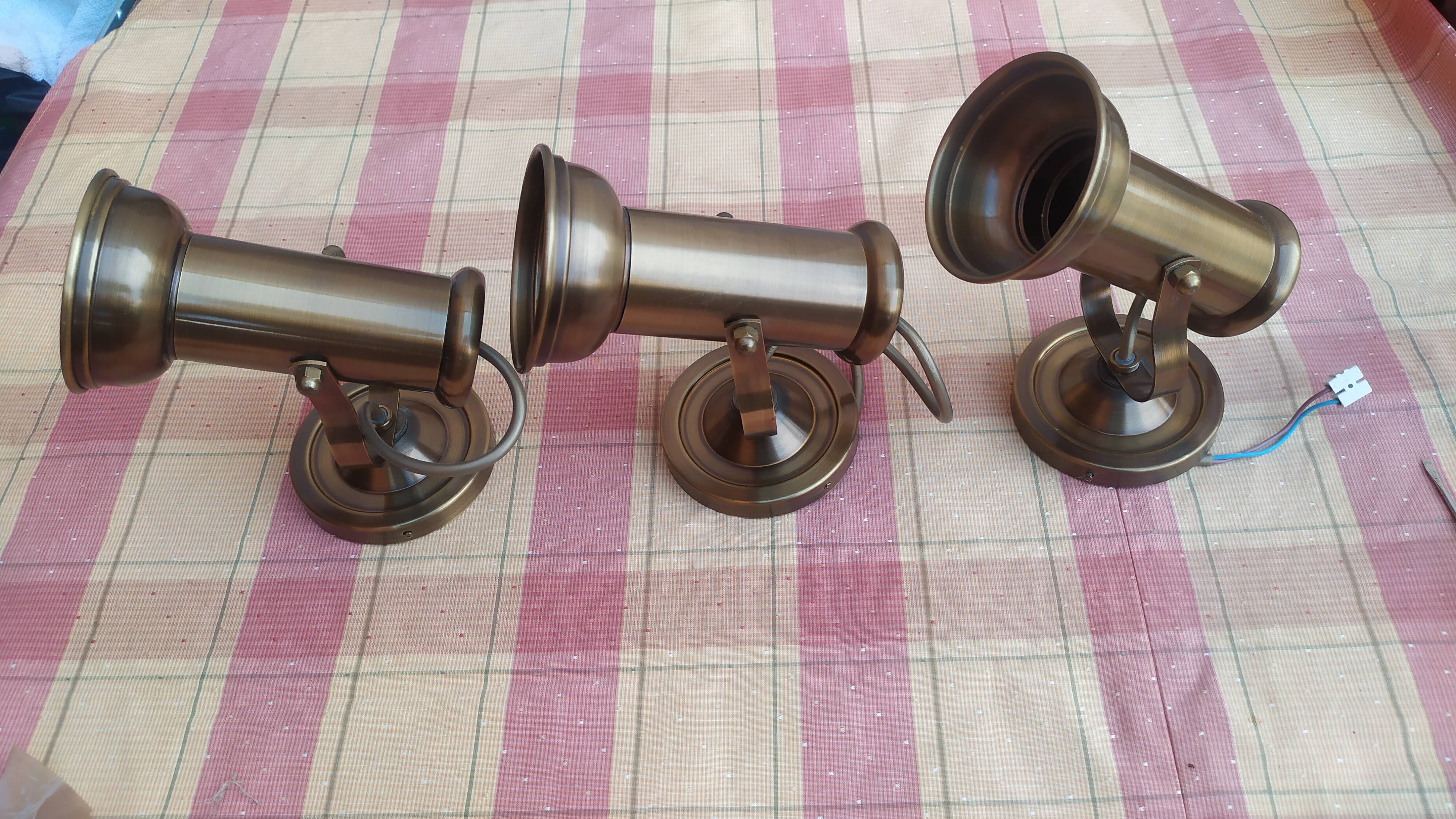 3 brass spotlights