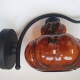 Three large vintage brown glass wall lights