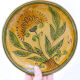 Bulgarian artisanal plate with autumn-hued flower