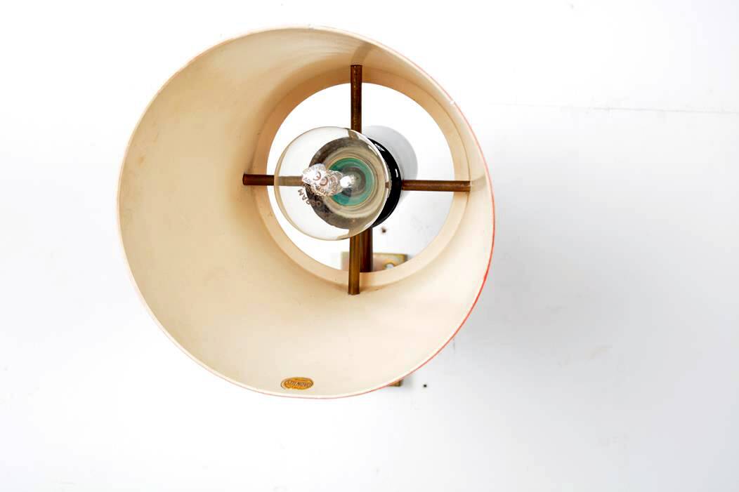 Old and rare Stilnovo wall light, red and black lacquered metal and brass With period label