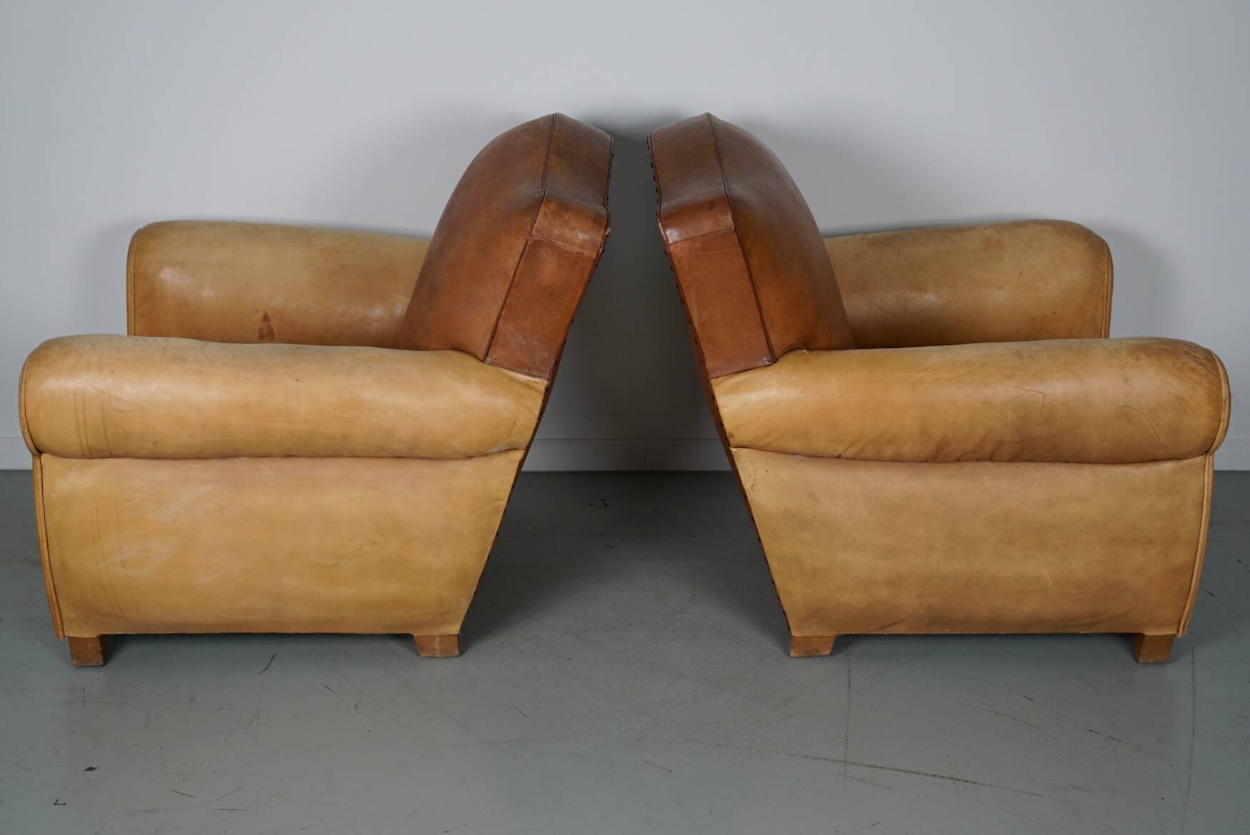 Pair of French Cognac Moustache Back Leather Club Chairs, 1940s