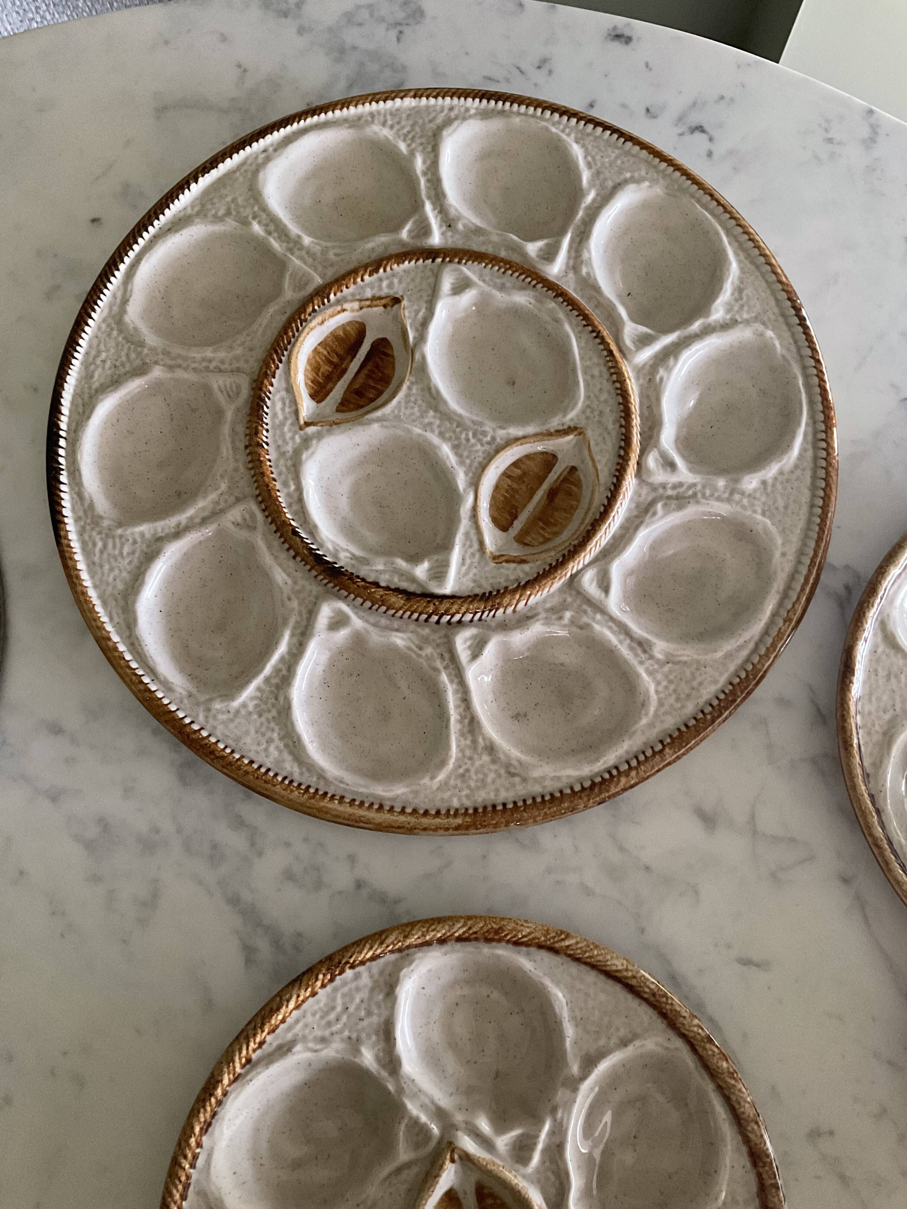 Set of 6 plates and 1 large oyster dish. Saint Clément.