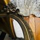 Large antique oval mirror