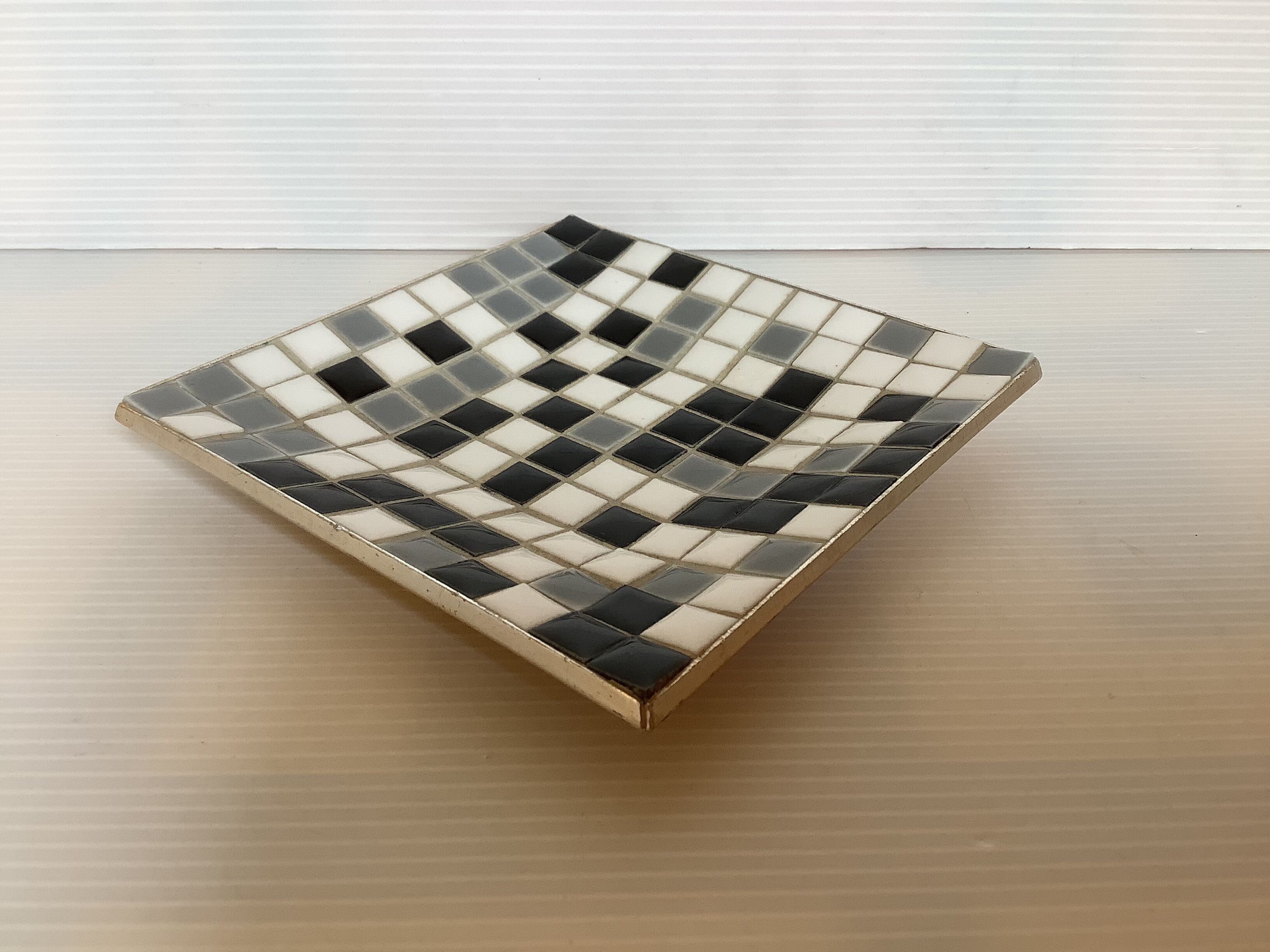 Mosaic grey, white, and black catch-all tray.