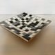 Mosaic grey, white, and black catch-all tray.