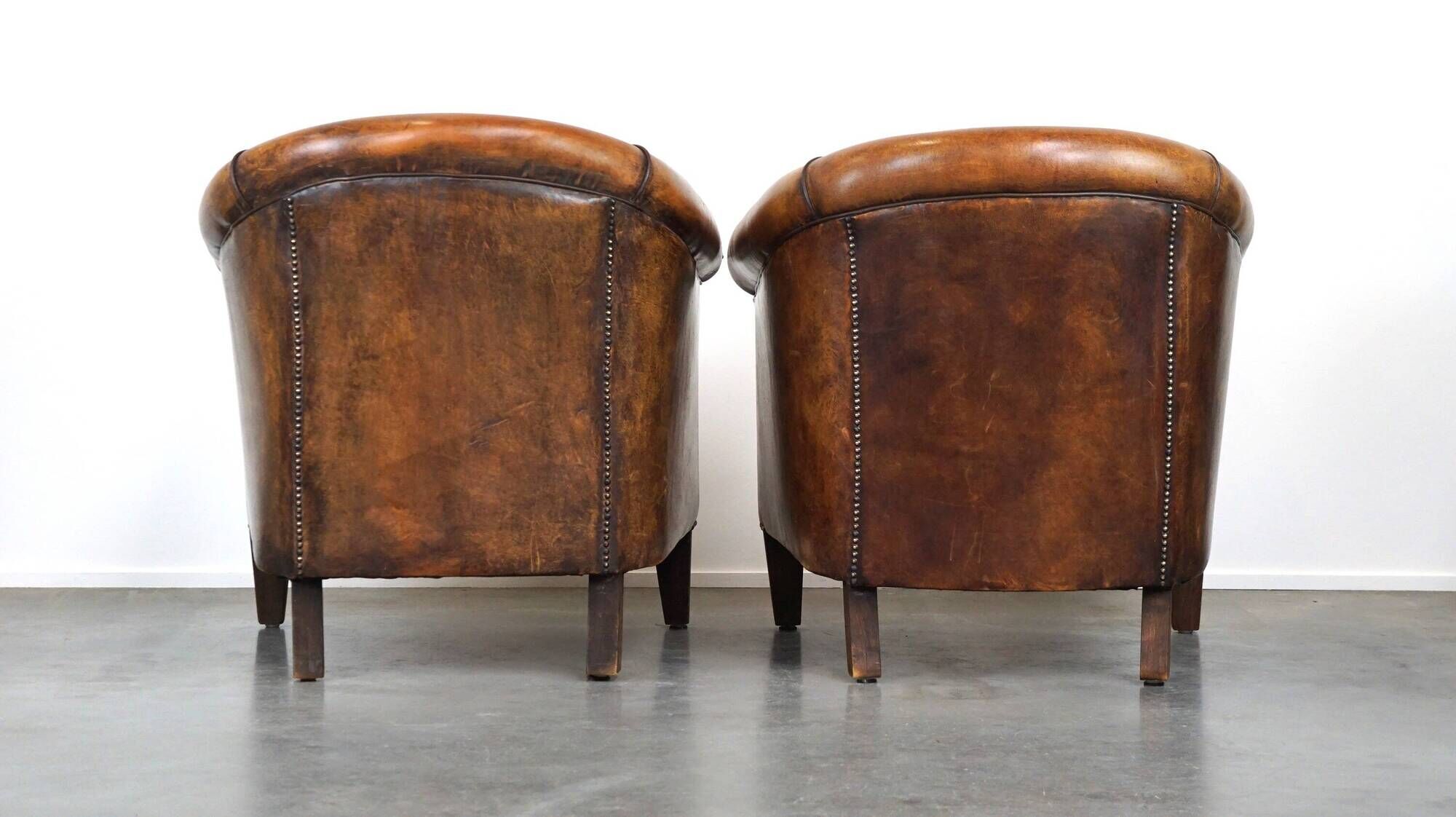 Set of 2 stylish yet beautiful and comfortable sheepskin club armchairs
