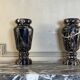 Paire de vases en marbre Portor, vers 1920