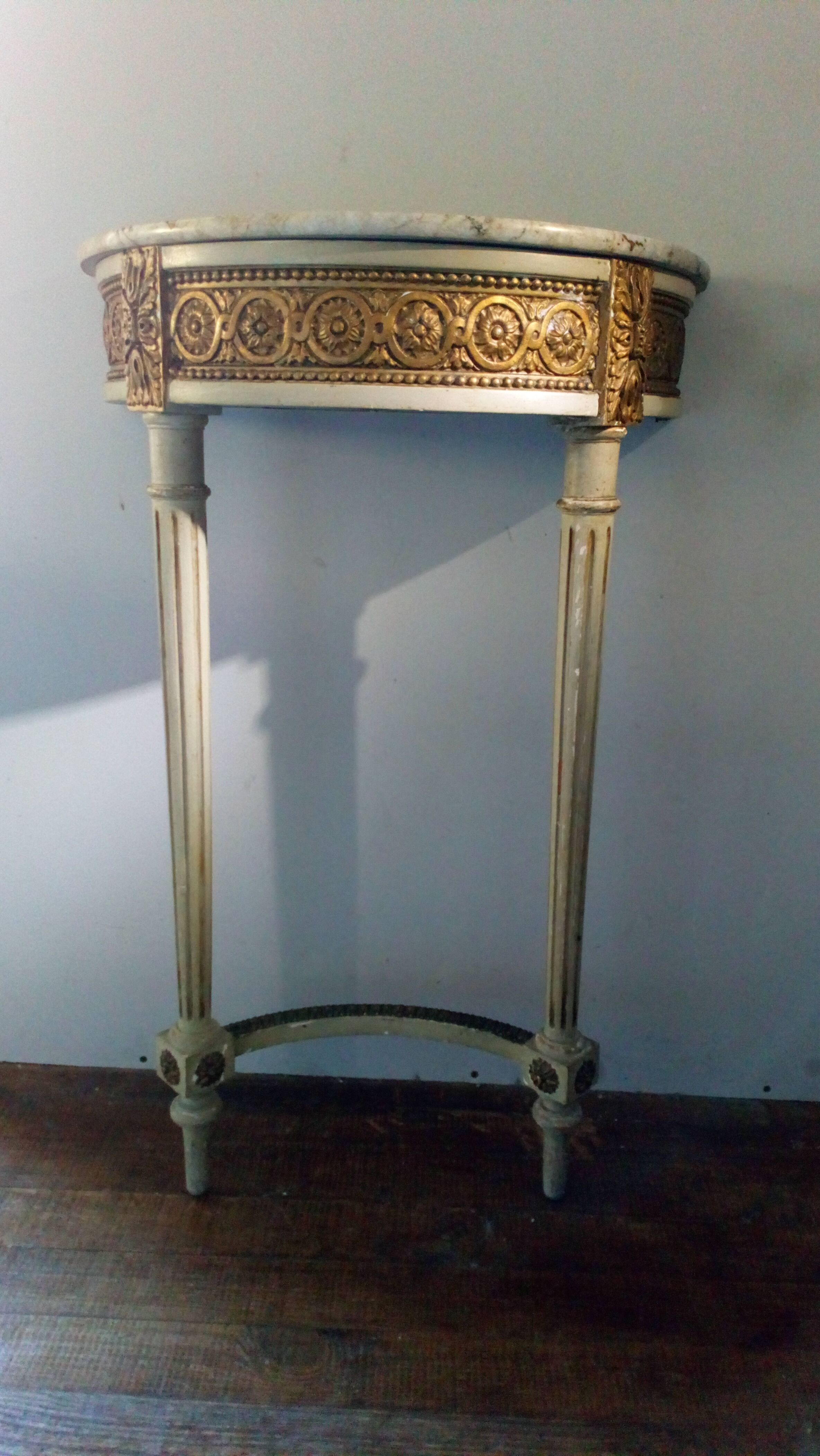 Golden and gray console