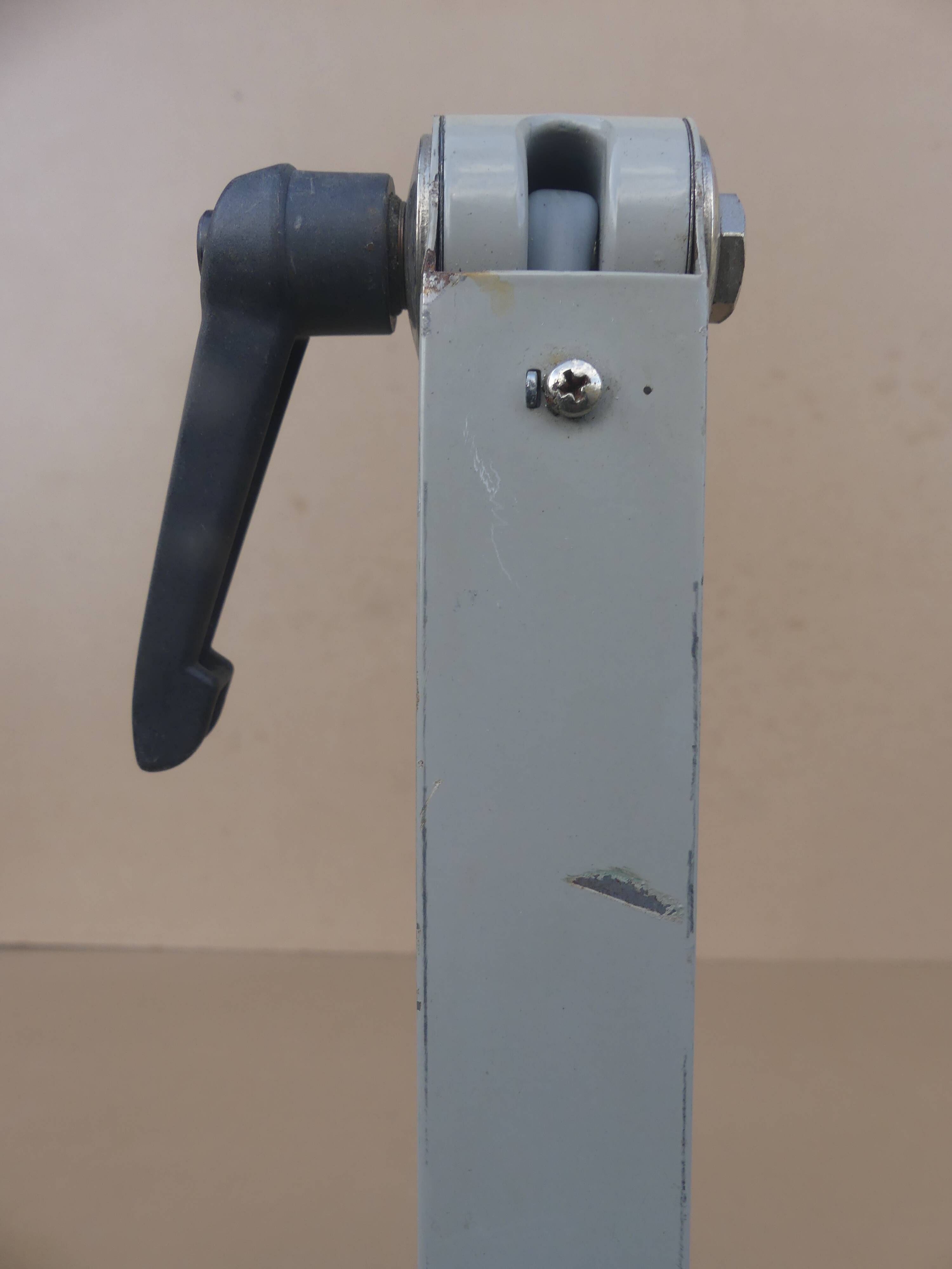 WALDMANN articulated workshop lamp with two industrial clamp arms for architects.