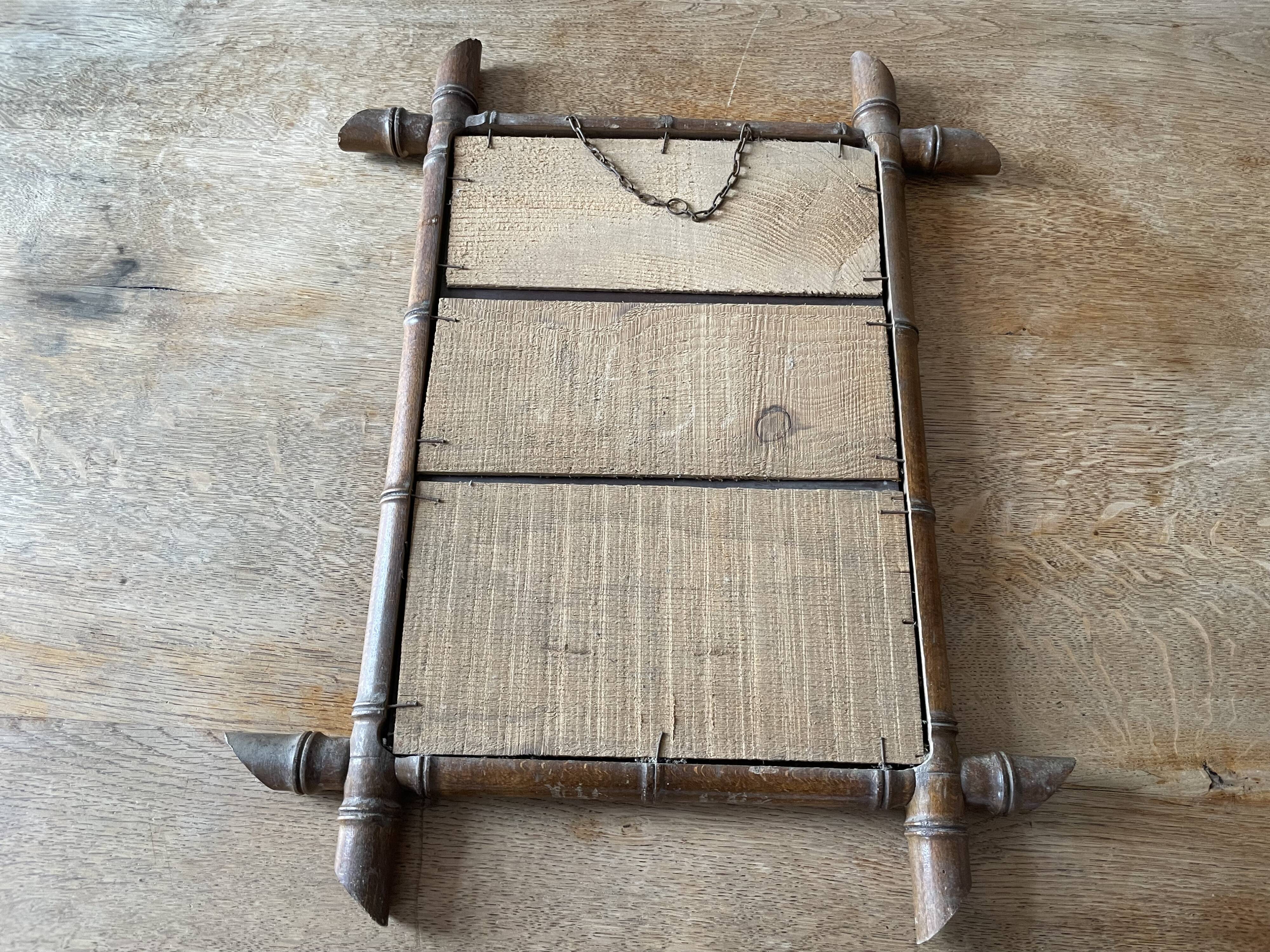 Faux bamboo wood mirror