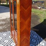 Glass library with rosewood marquetry in the Louis XV style.