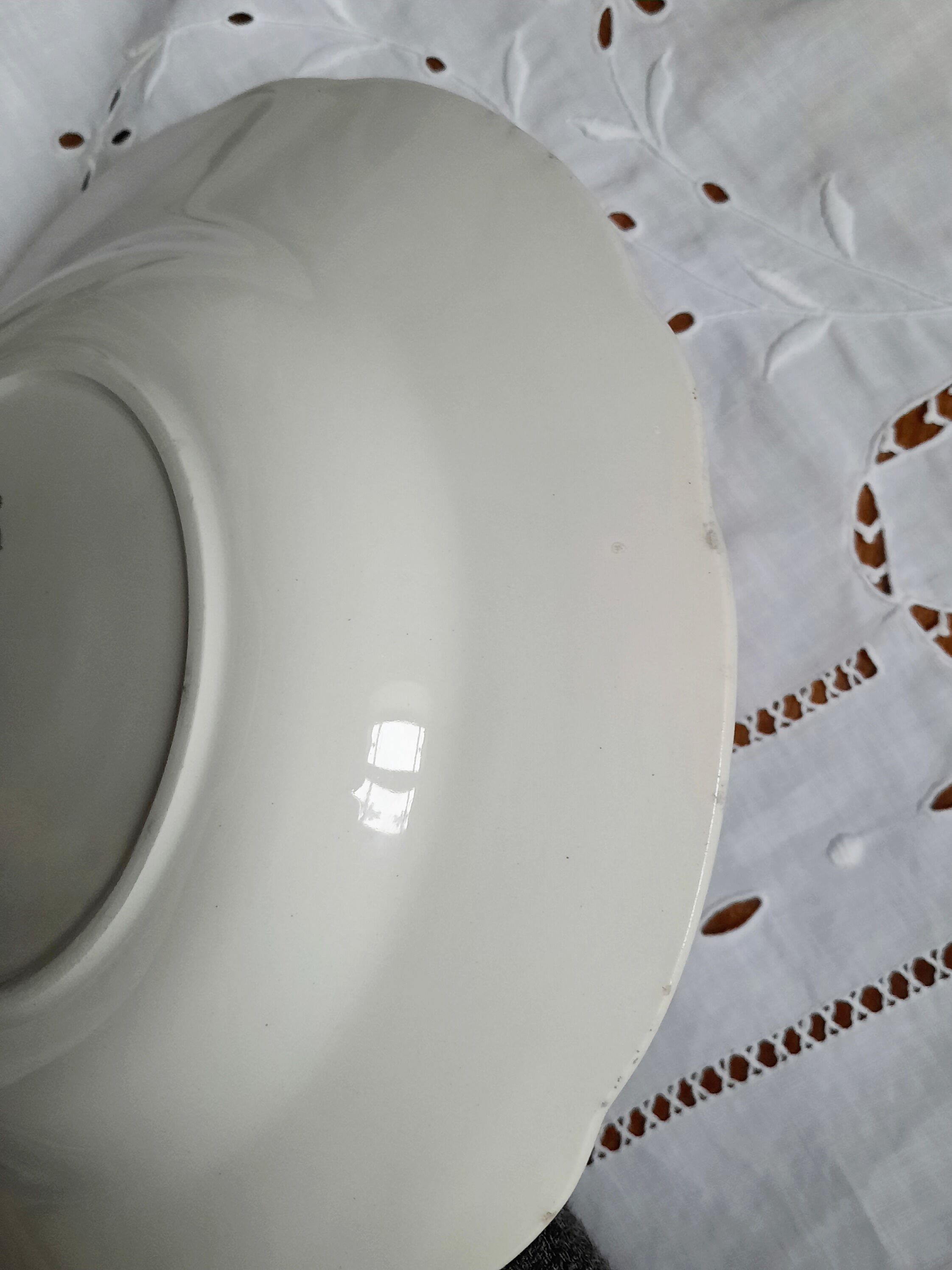 Old hollow plates mismatched in earthenware