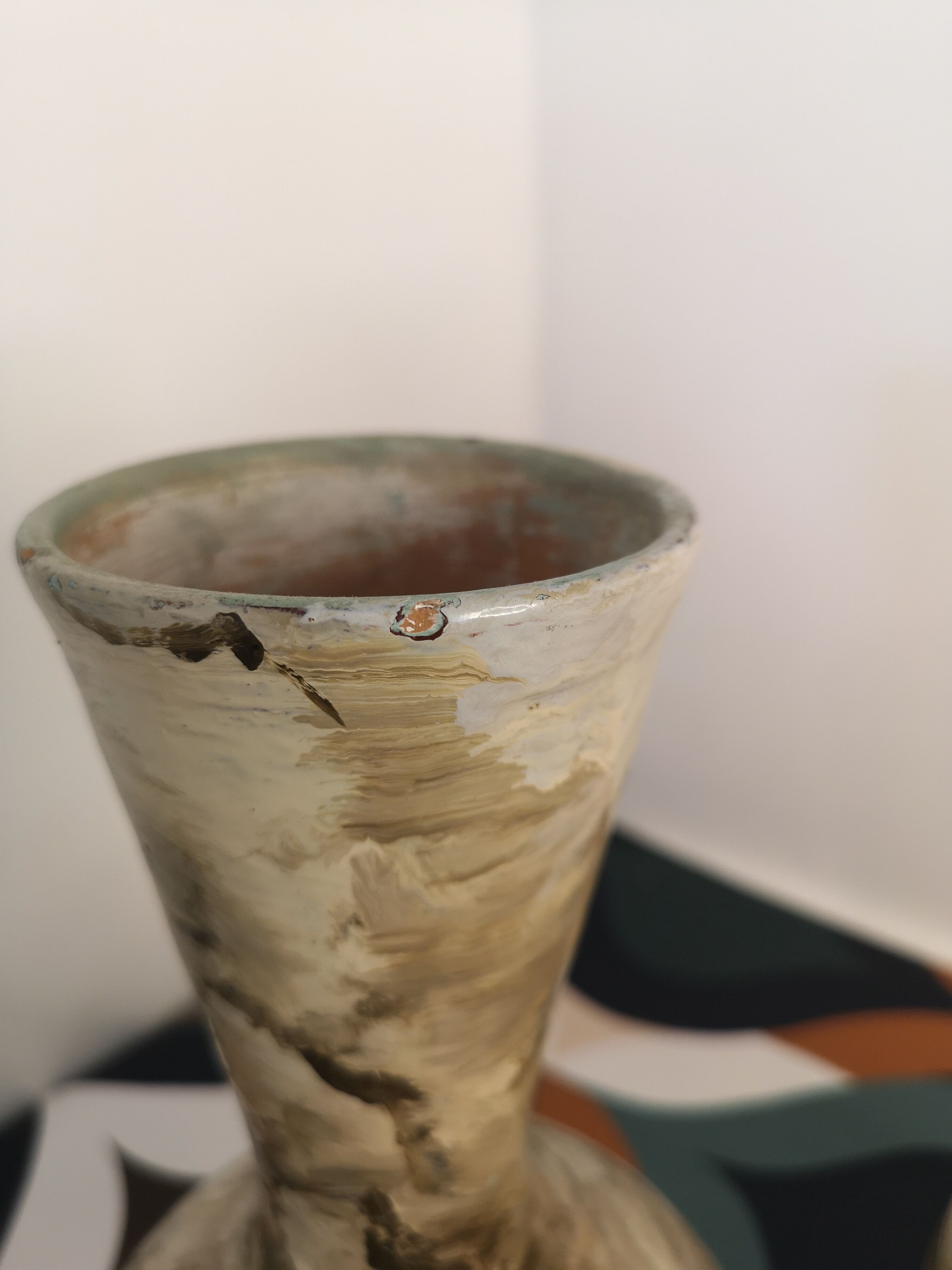 Pair of hand-painted terracotta vases