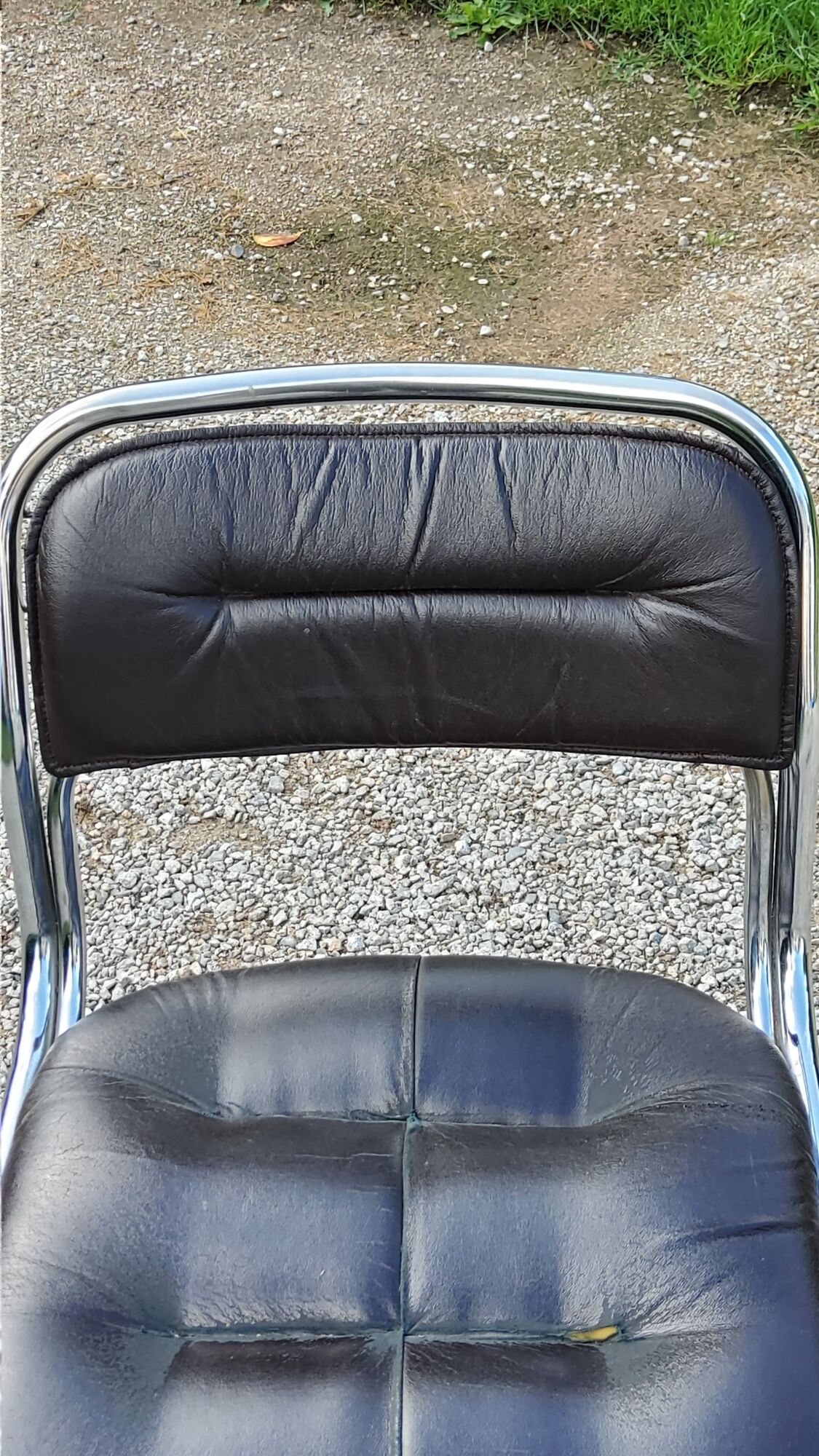 Chair from the 70s in chromed metal and brown moleskine