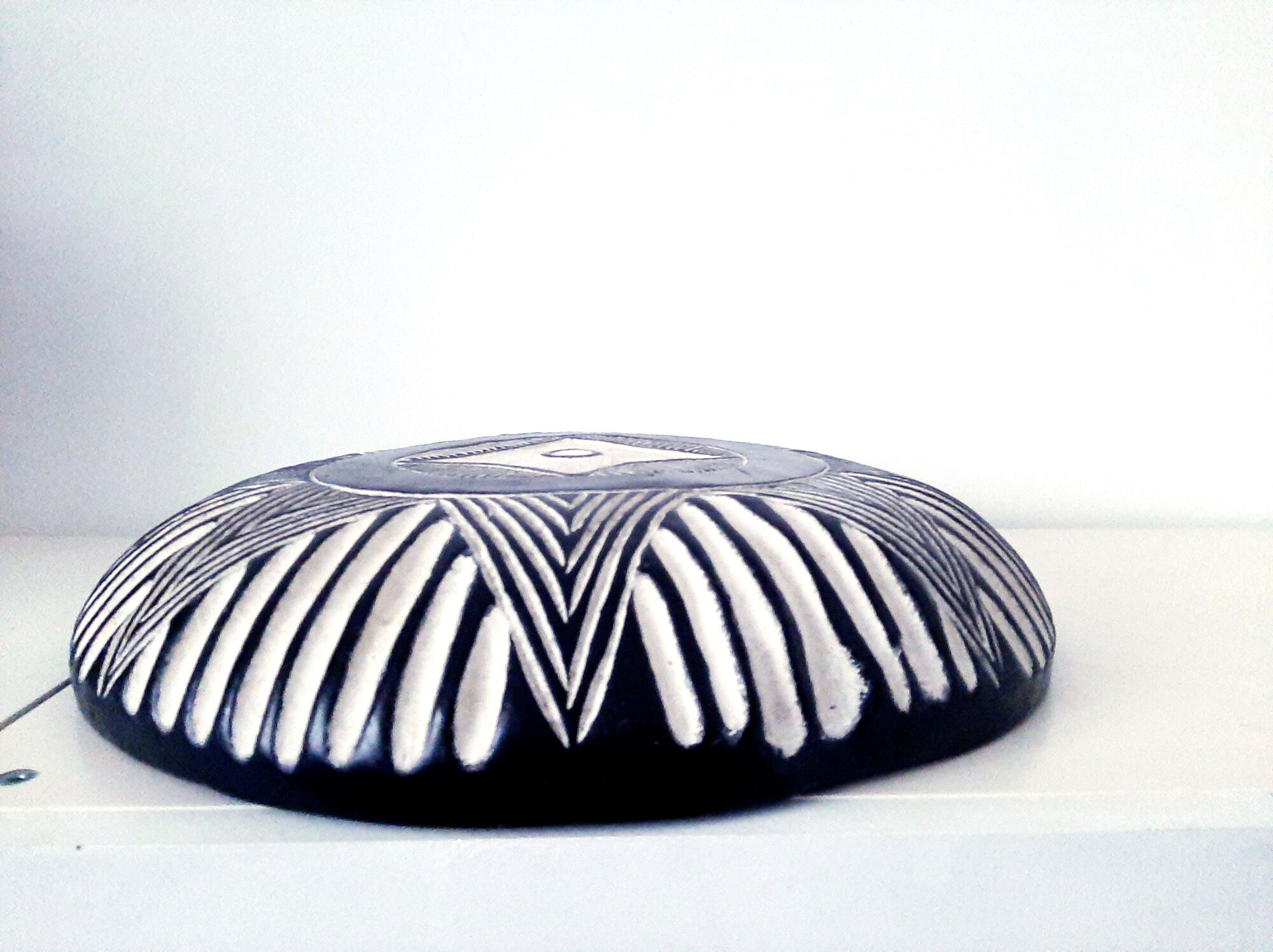 Traditional African tribal shield Bamileke round, wooden, black white wall decoration