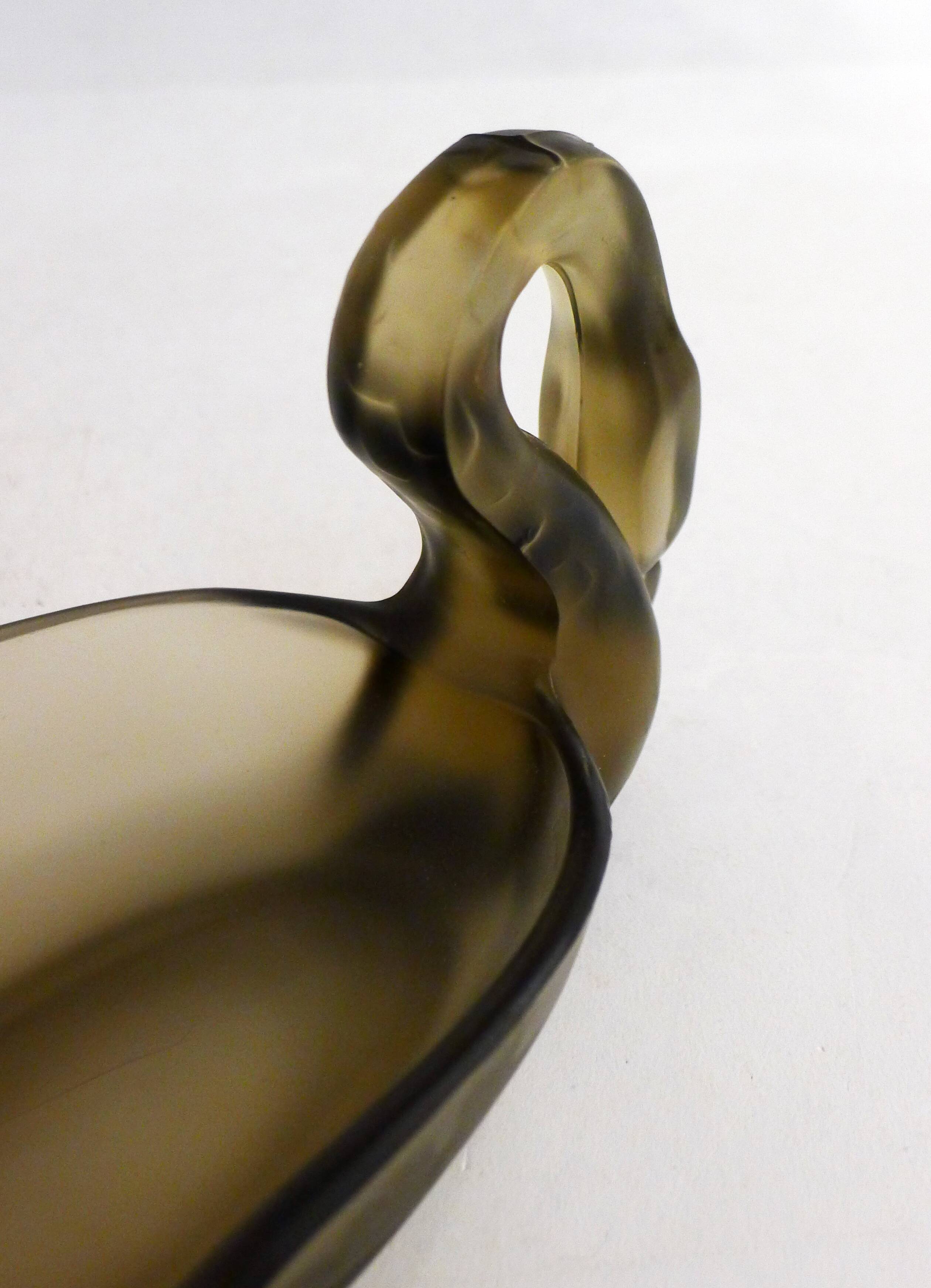 Smoked glass swan pocket emptier