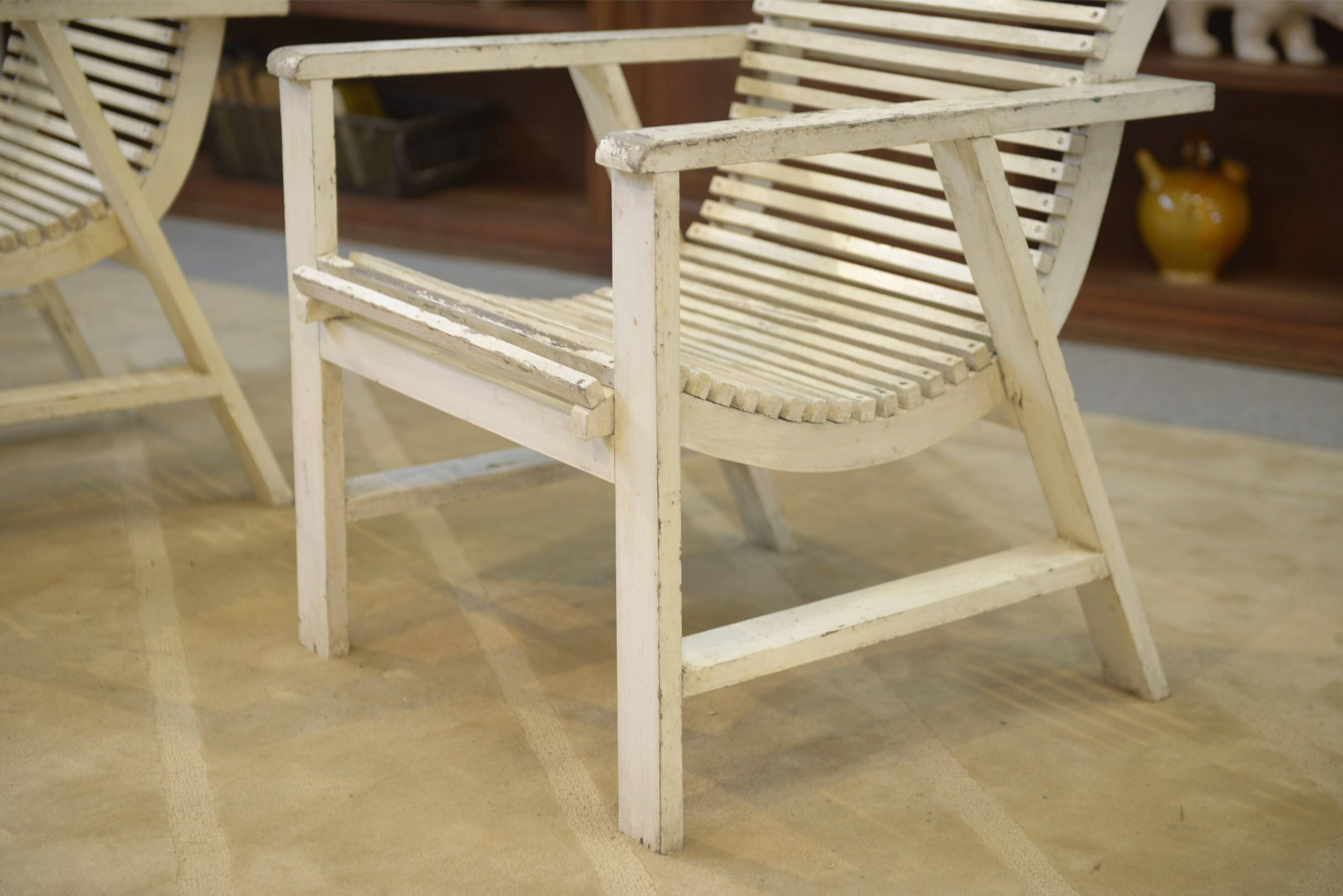 Paire de fauteuils en bois 1950’s