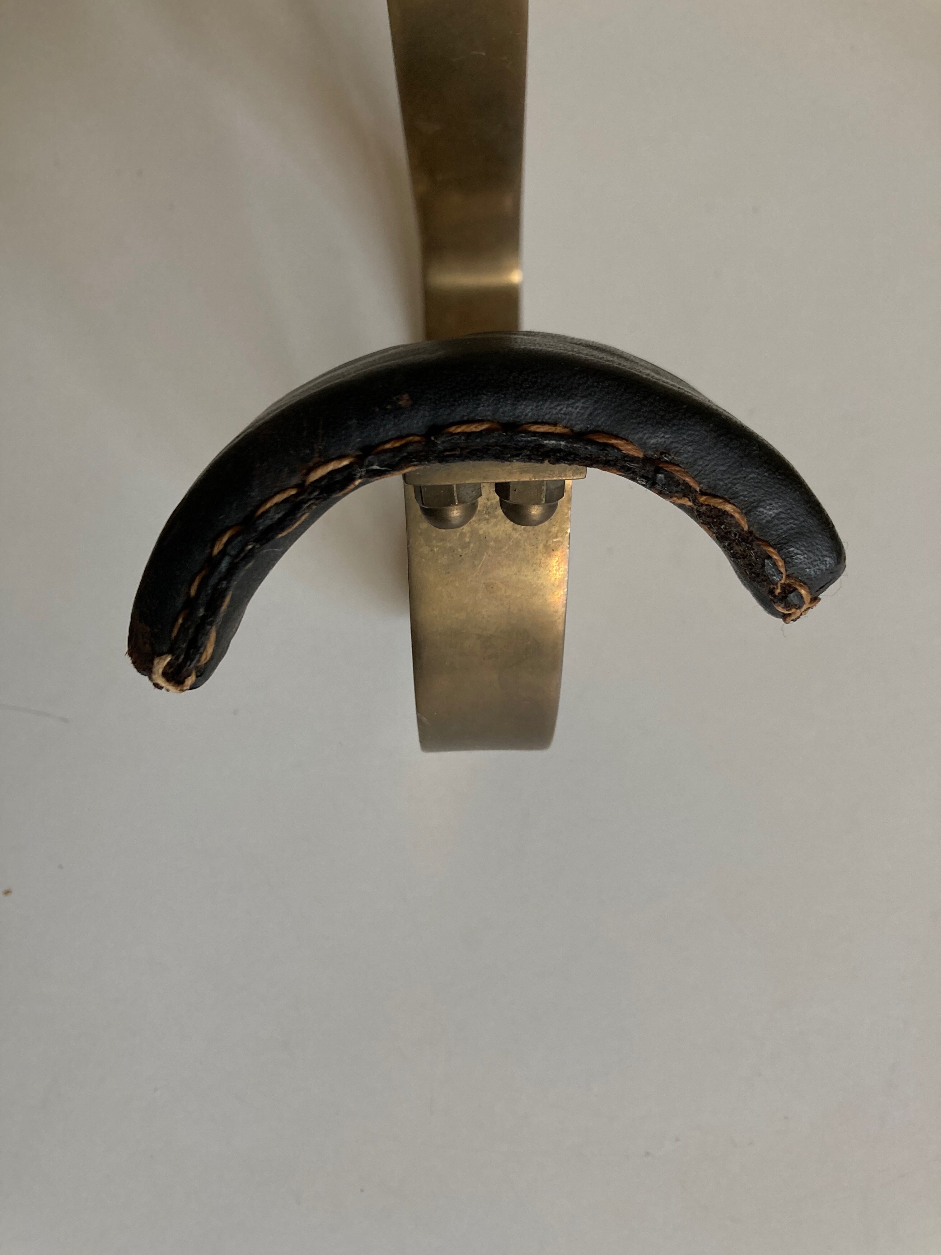 Adnet hook in bronze and leather 1950