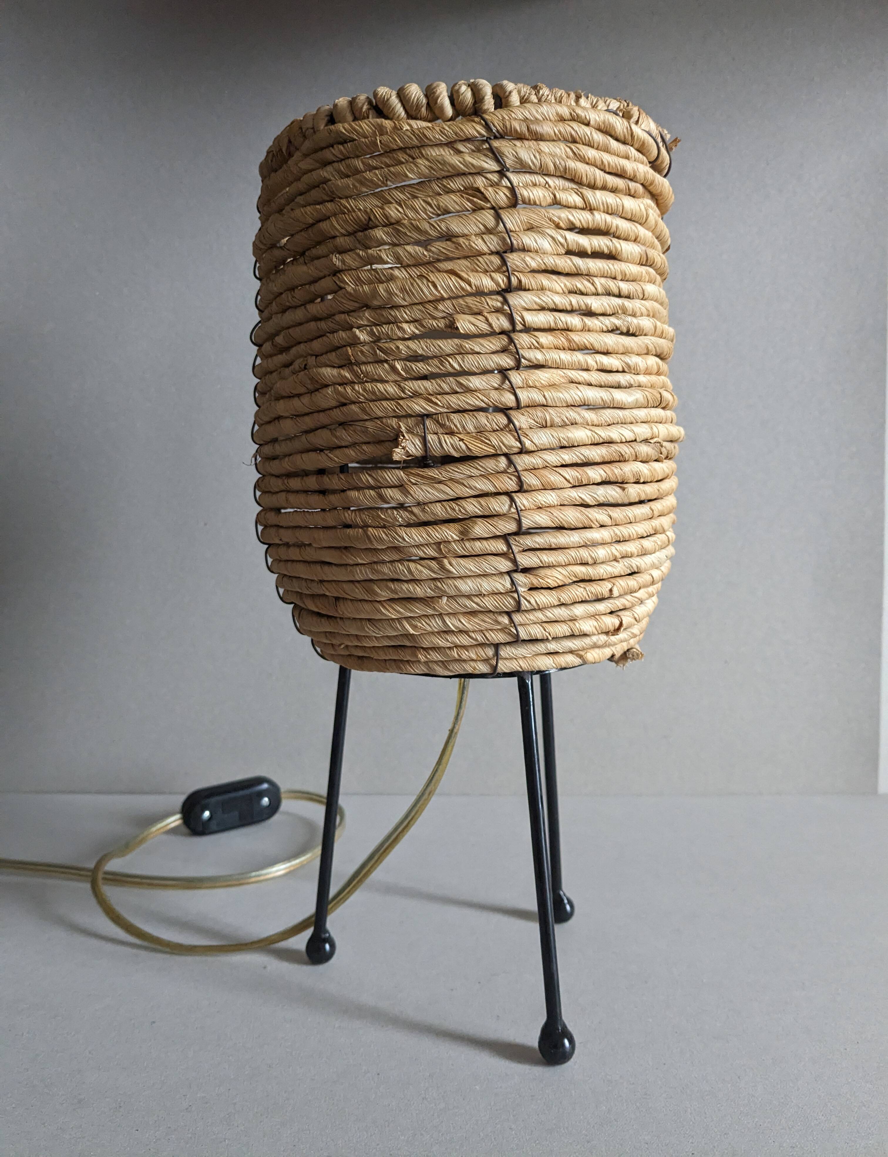Fiber and metal tripod lamp