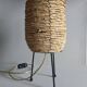 Fiber and metal tripod lamp